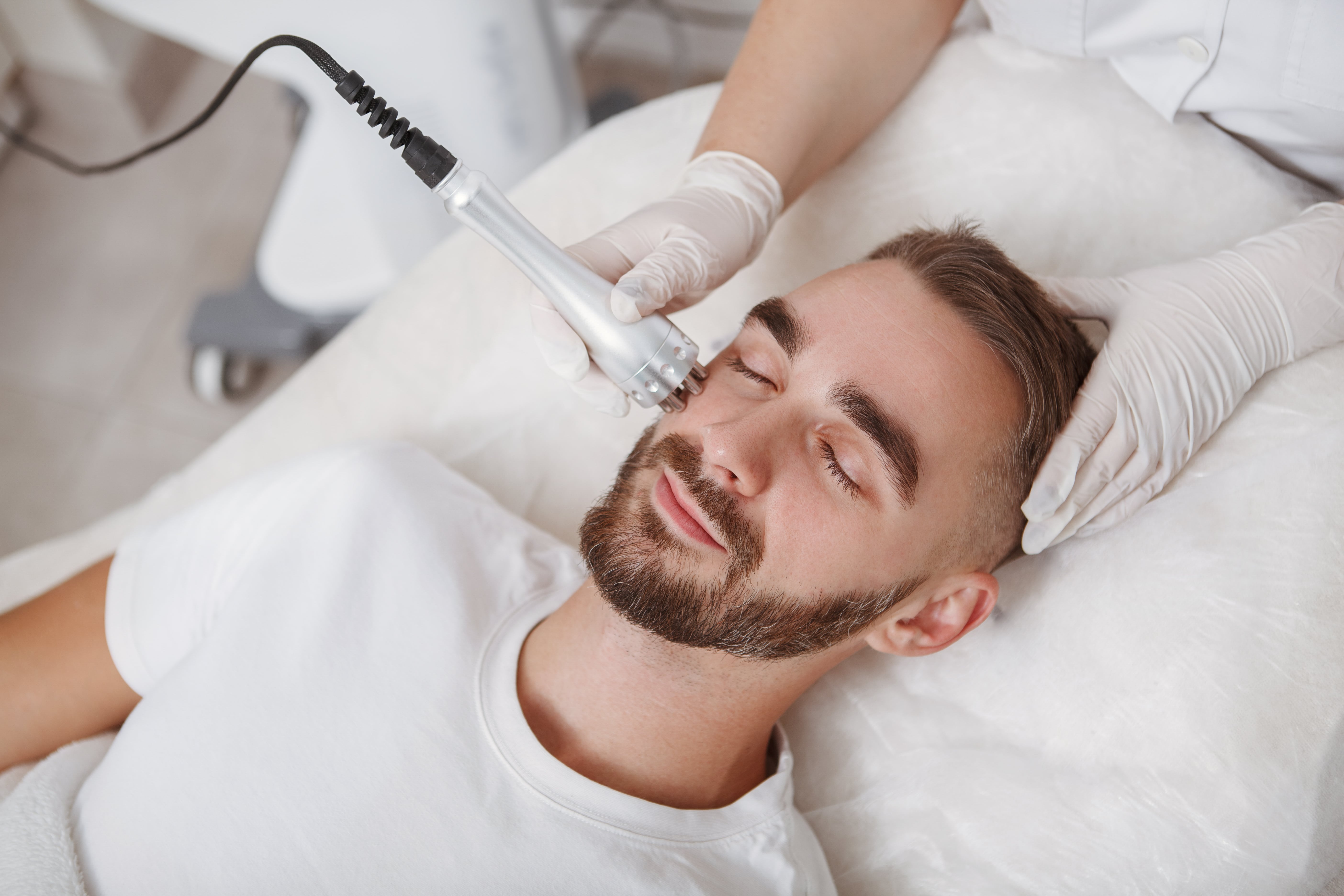 Man getting a special facial procedure