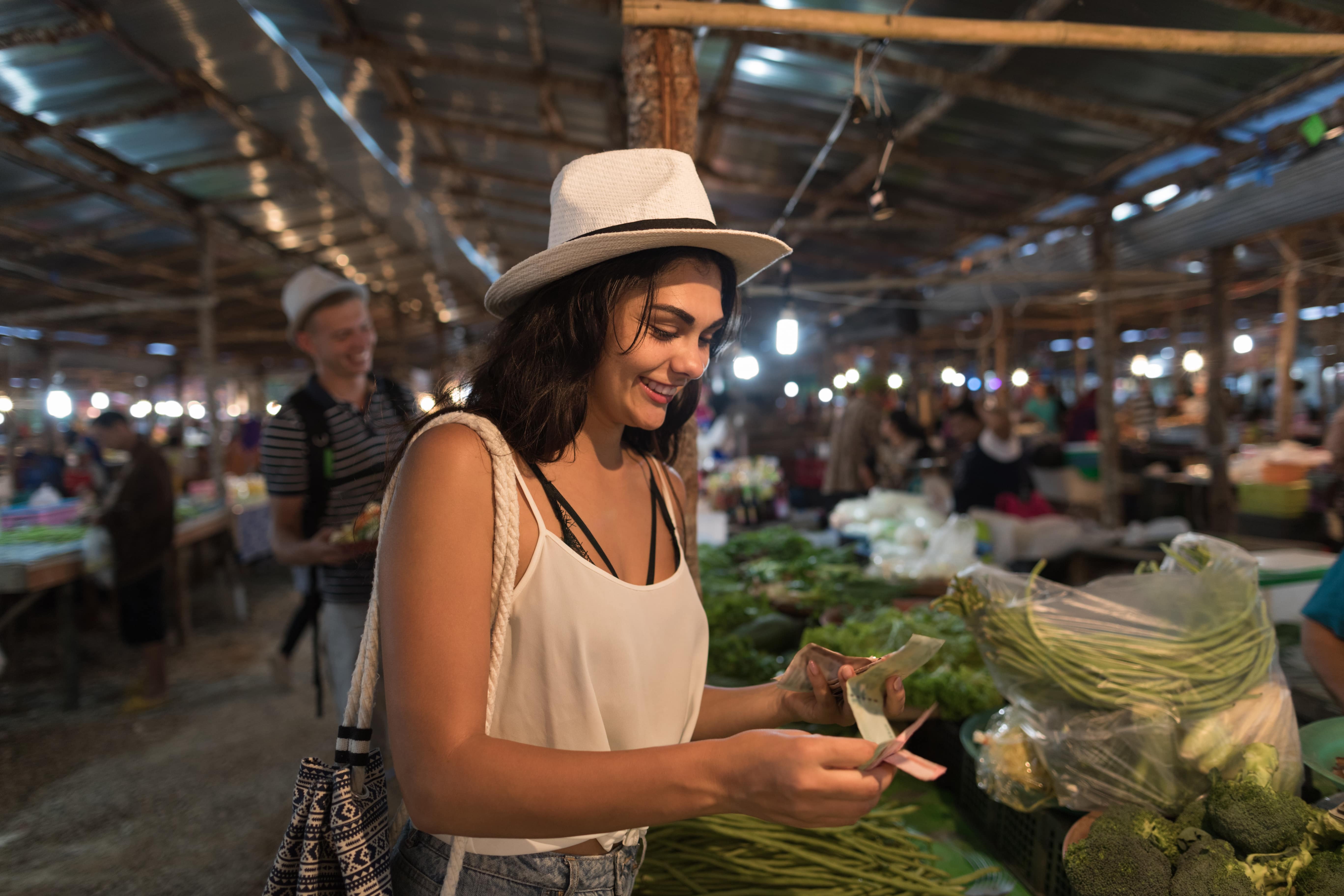 paying at the market