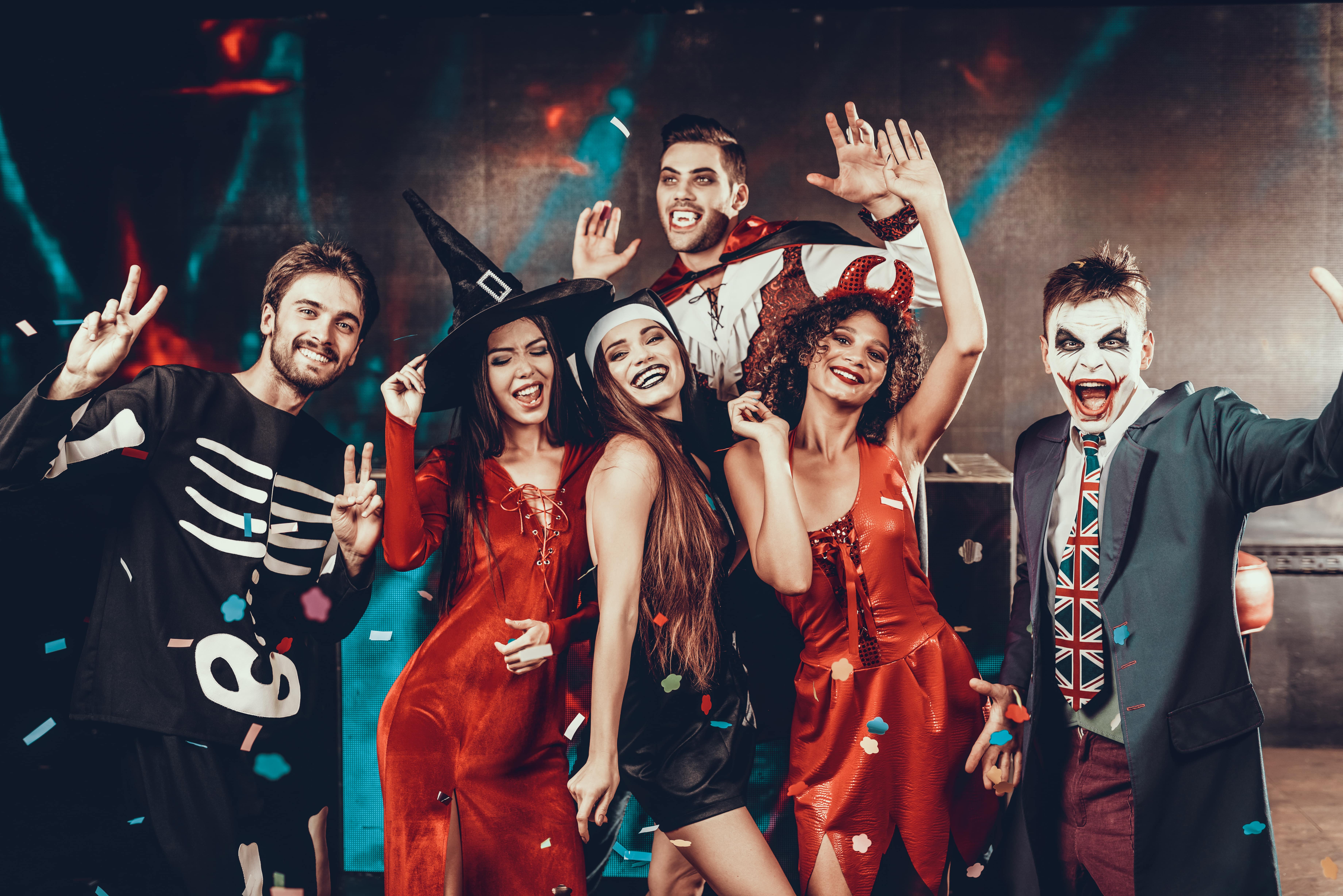 Young Smiling People in Scary Costumes for Halloween